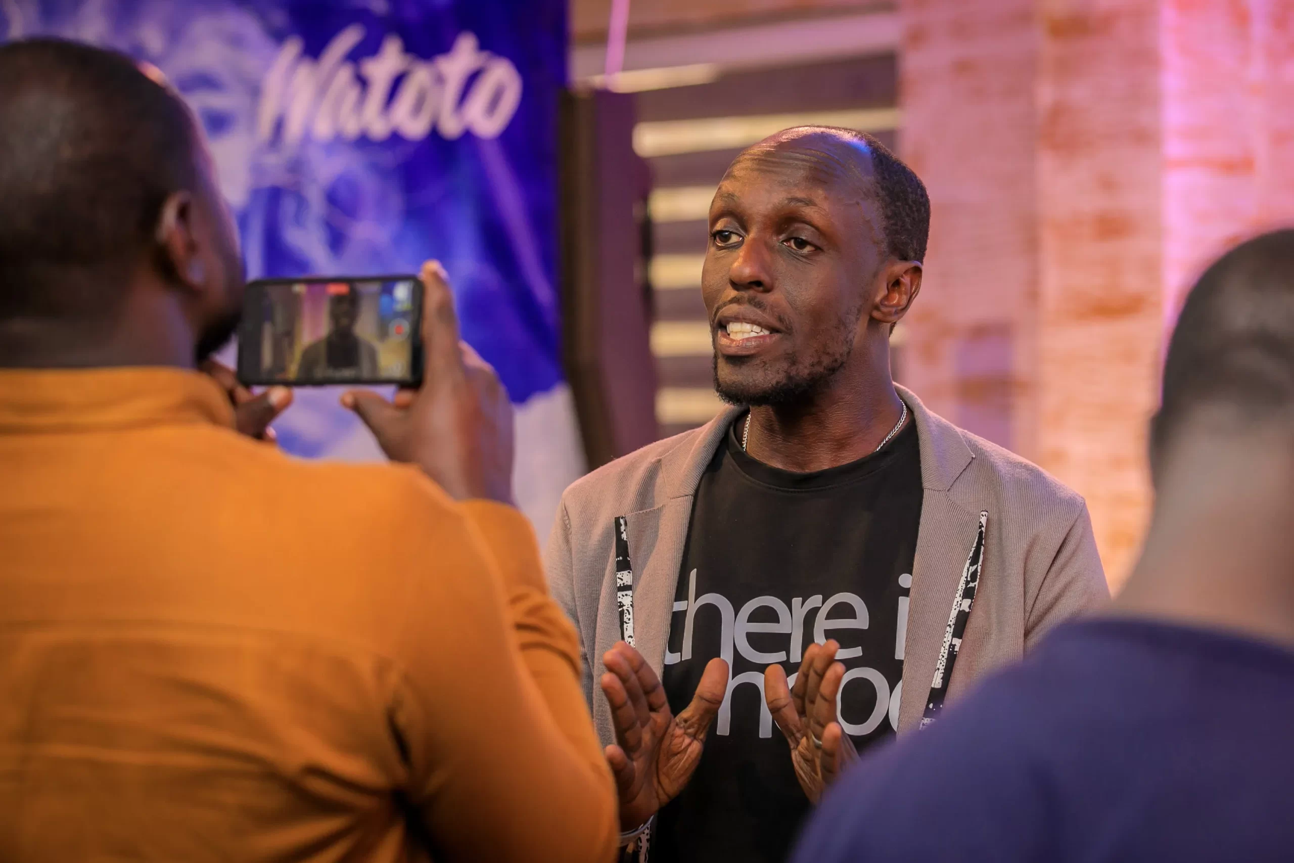 Pr. Graham Tugume gives an interview during the press conference